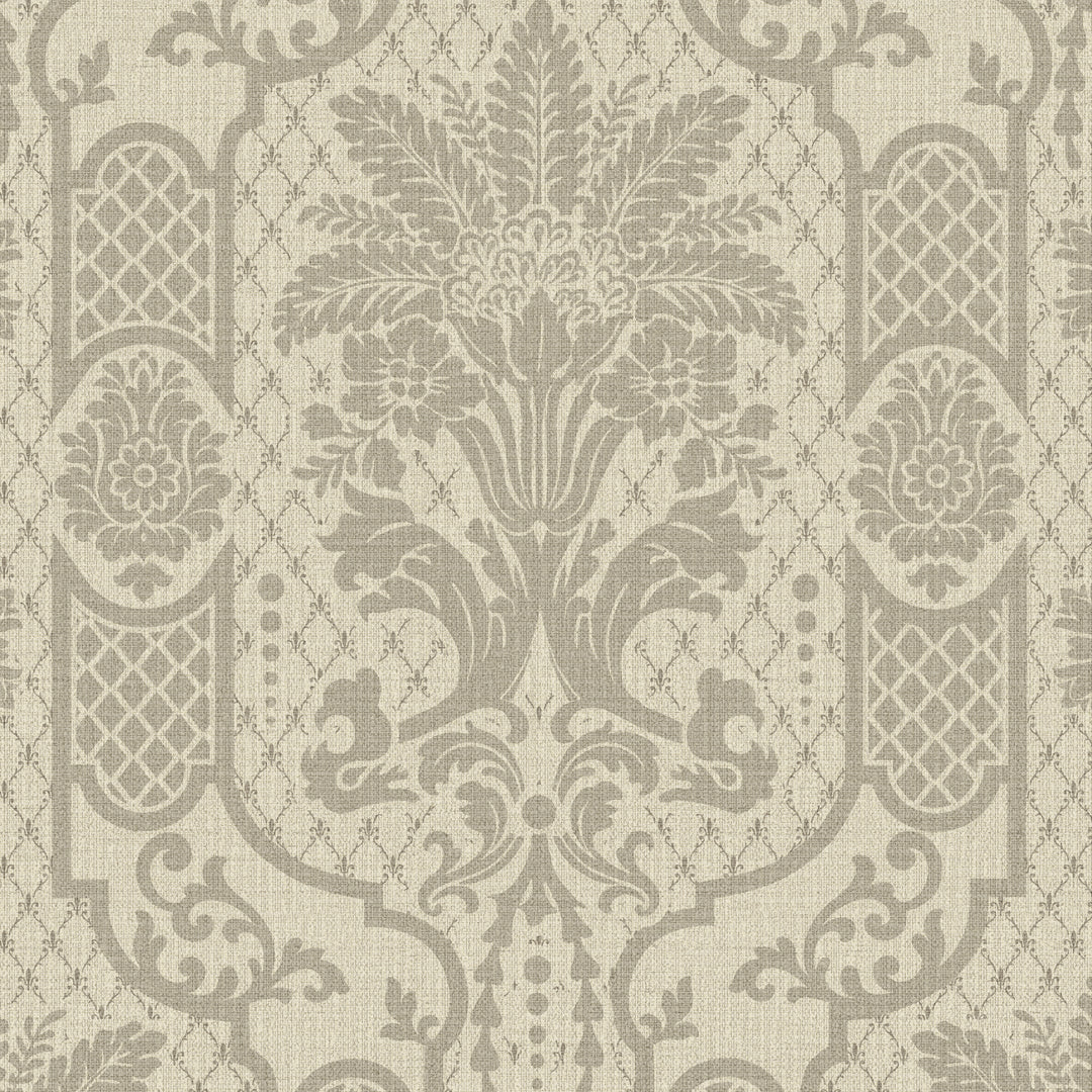 A close-up of a damask patterned wallpaper or fabric in warm beige and taupe-gray tones, showing a symmetrical floral and scroll motif with a subtle woven texture.
